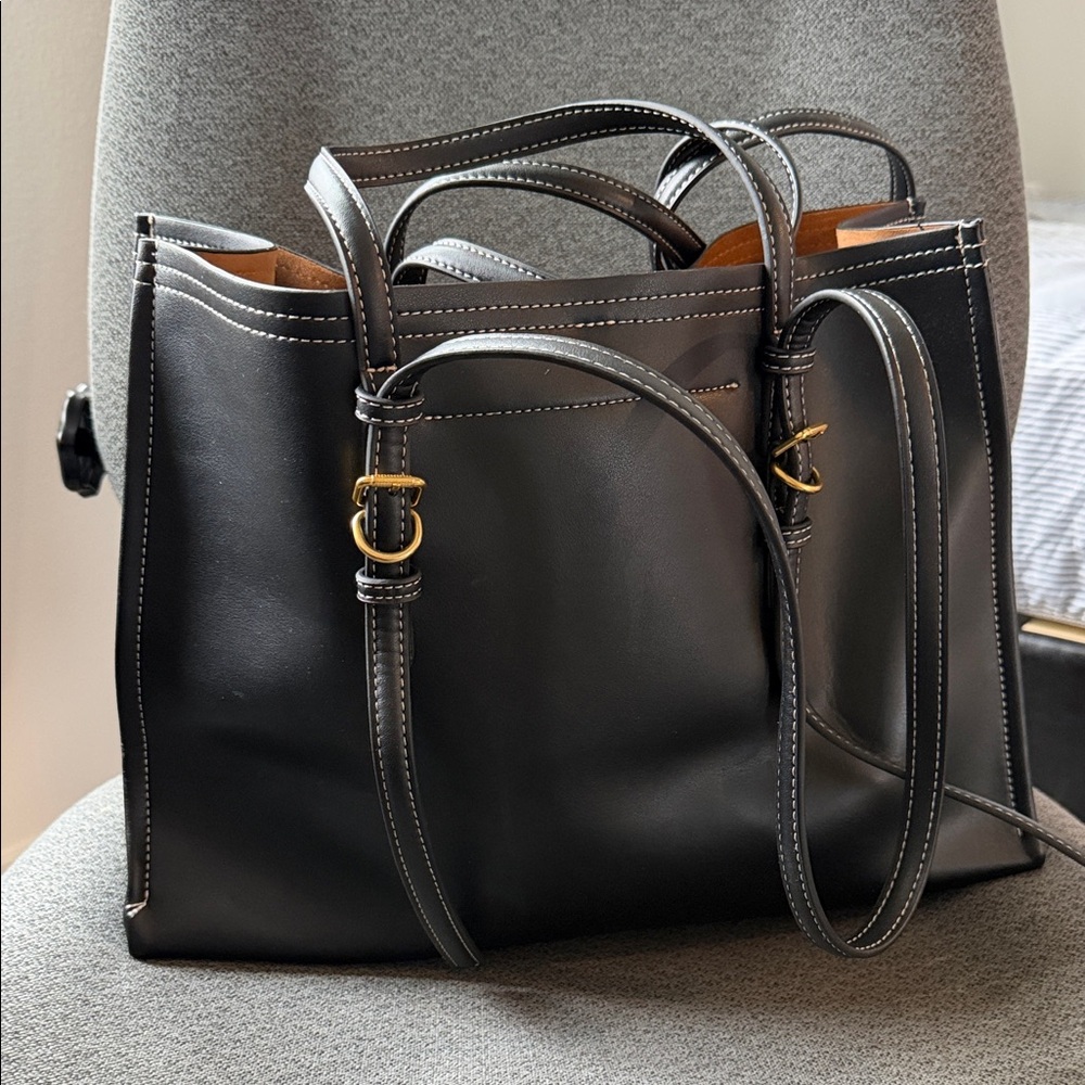 Elegant Black Leather Shoulder Bag with Gold Accents